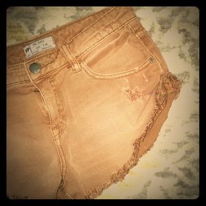 Free people distressed super cheeky shorts size 24